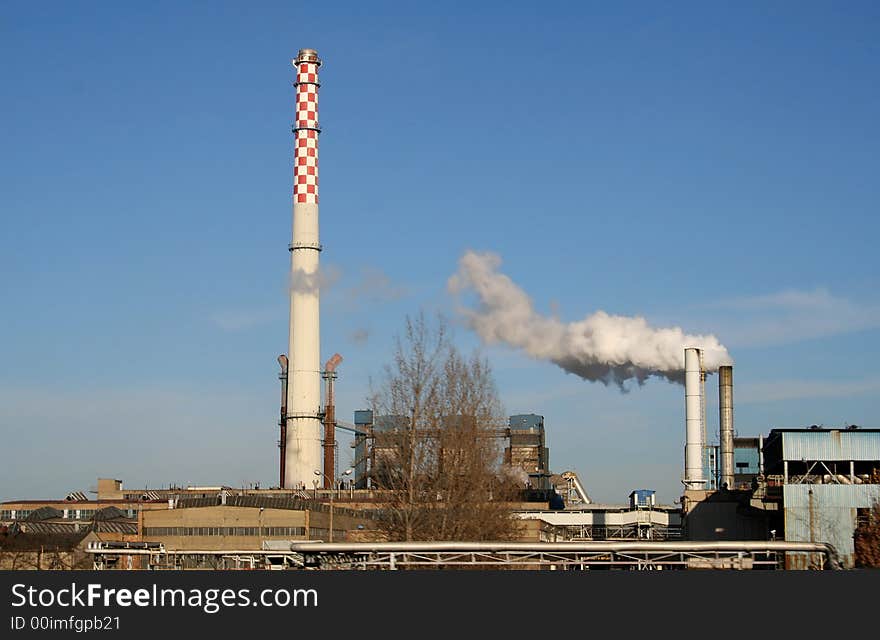 Smoking factory chimney in poland