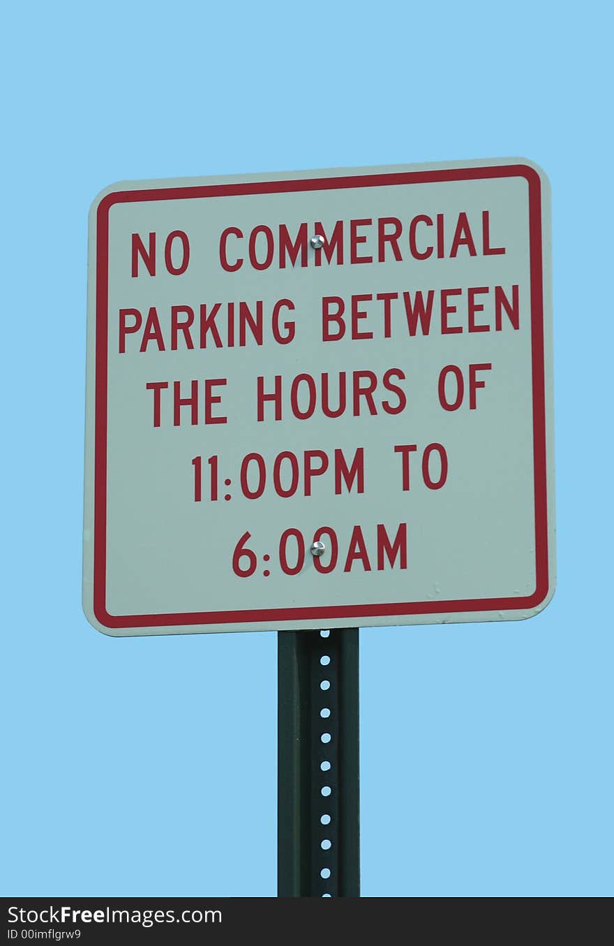 No commercial Parking Sign against blue sky. No commercial Parking Sign against blue sky