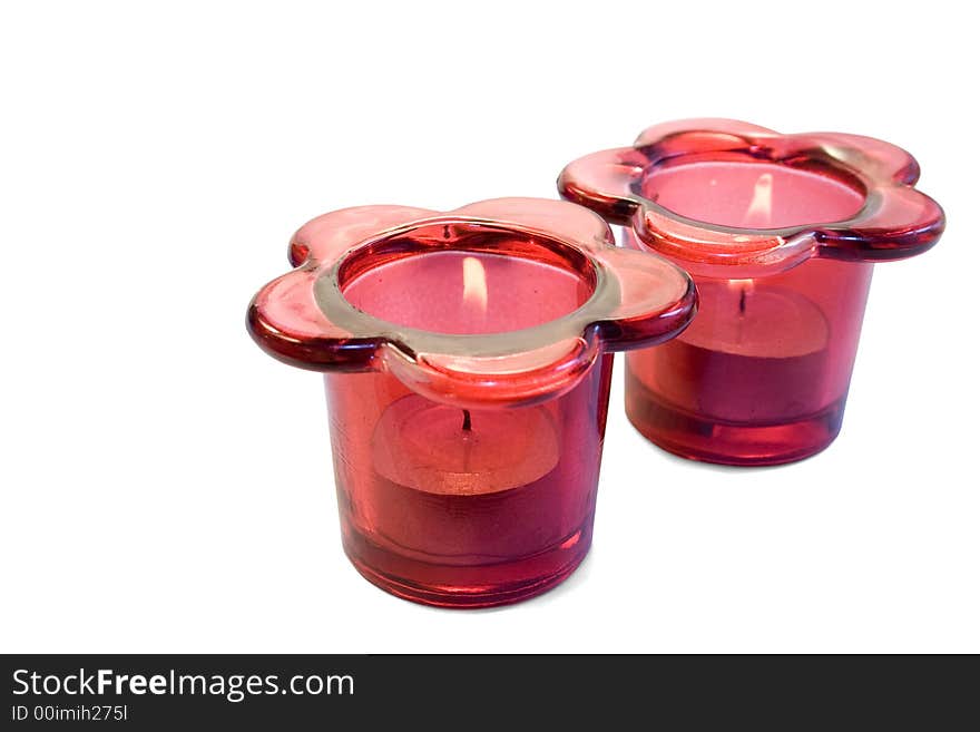 Red candle holders isolated on white