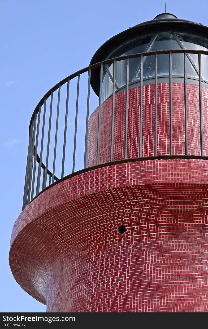 Detail of the red lighthouse at castiglione della pescaia, italy