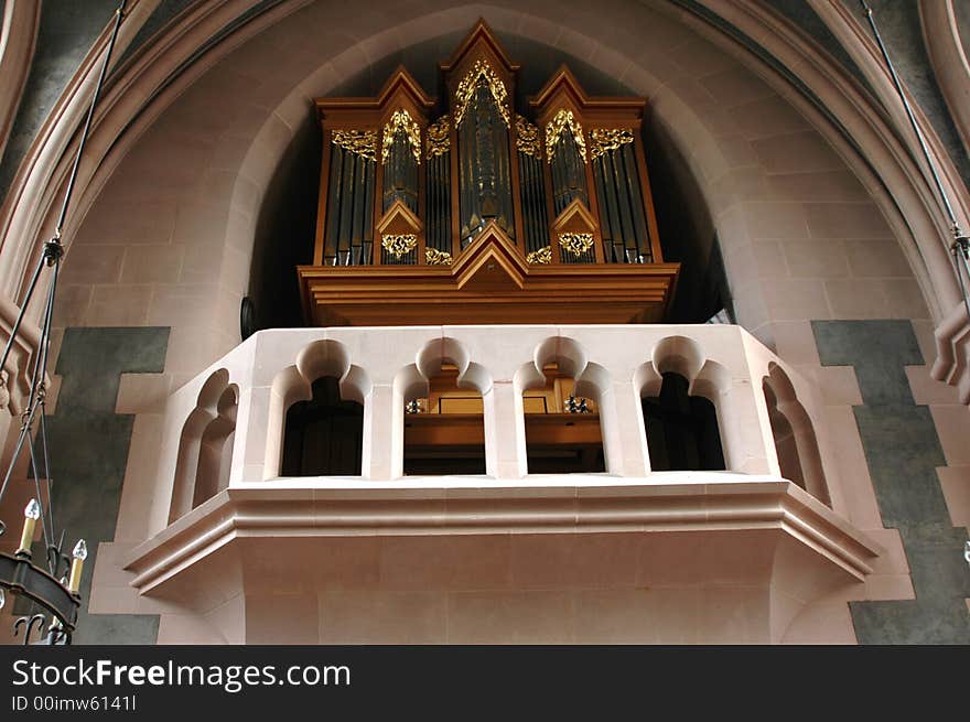 Church organ pipes up close in details.