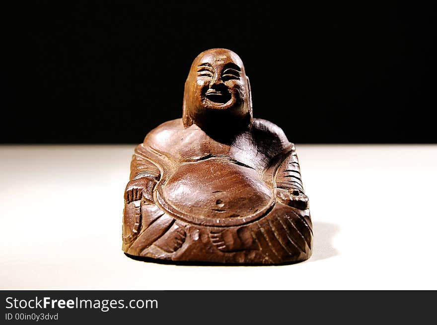 Photo of figurine of sitting Buddha