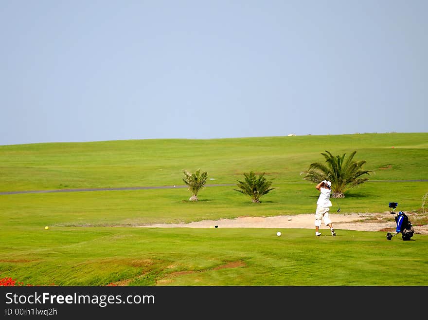 Man Playing Golf