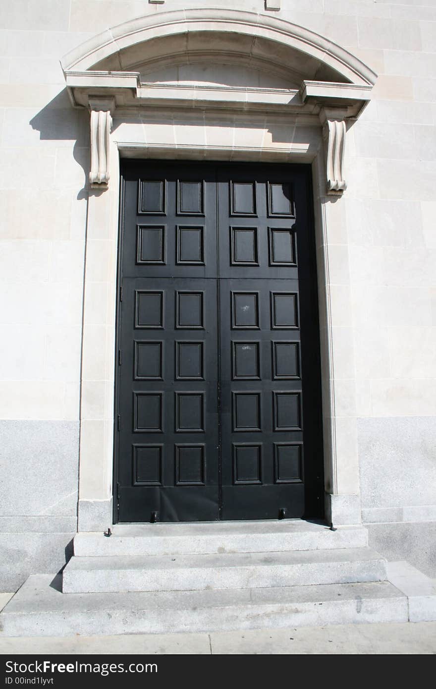 Black door of a church in downtown Los Angeles, CA