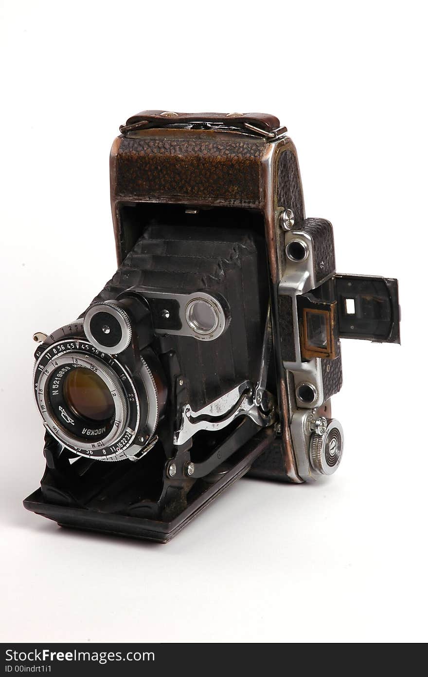 Old roll-film camera isolated on white