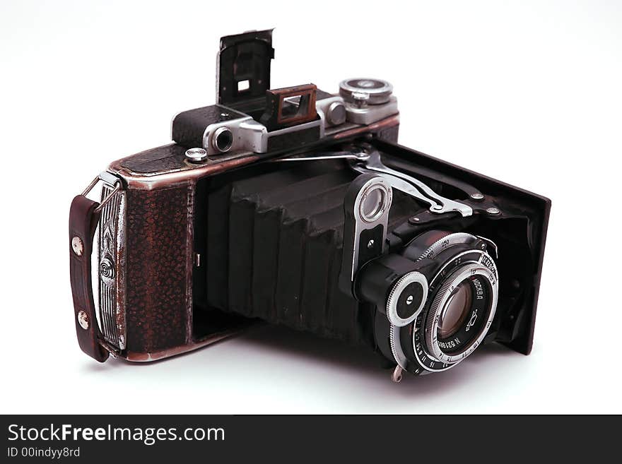 Old roll-film camera isolated on white