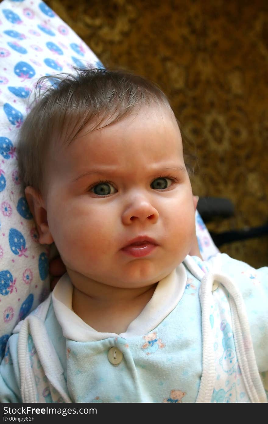 A newborn baby feeding breast