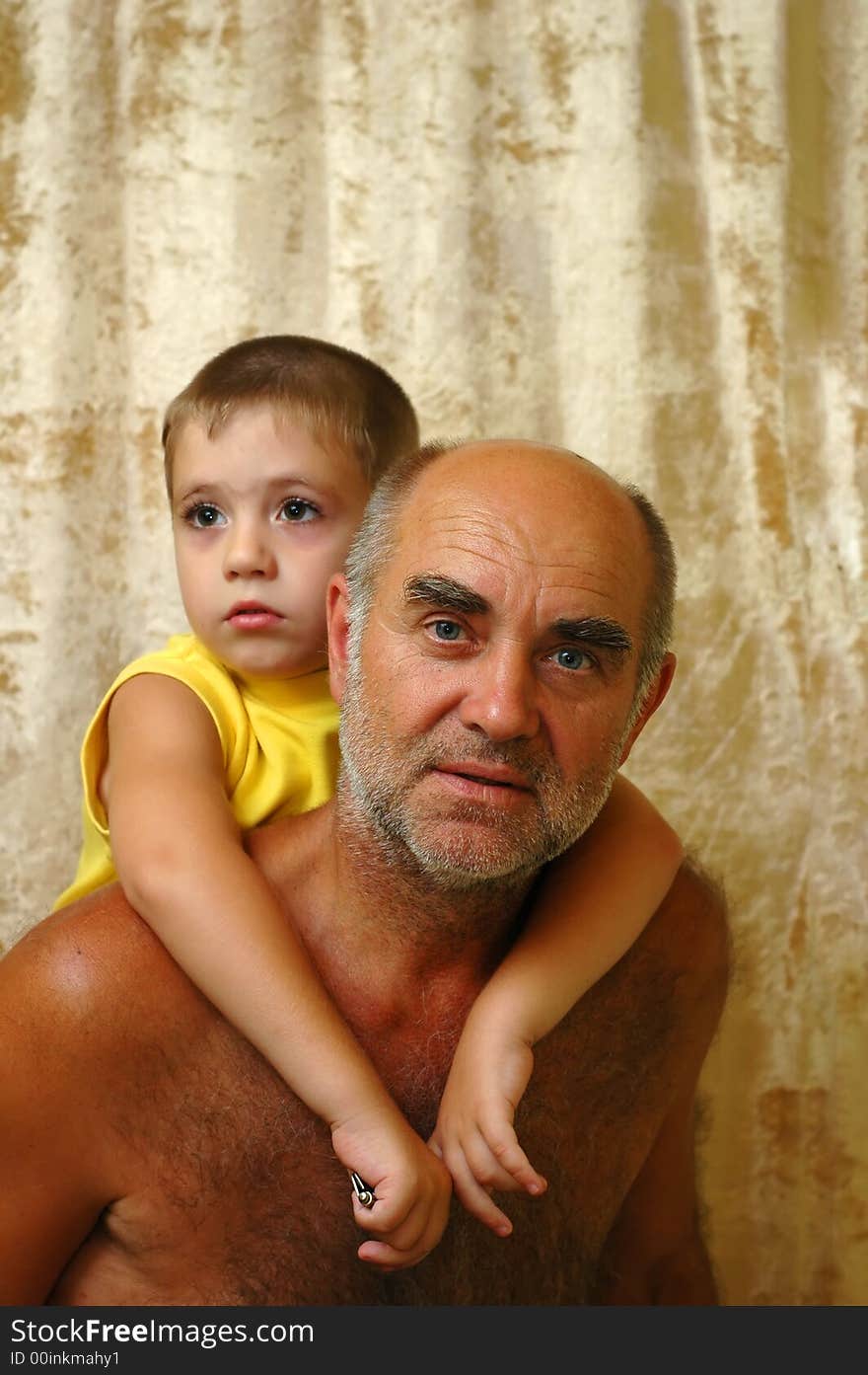 A senior man with a grandson