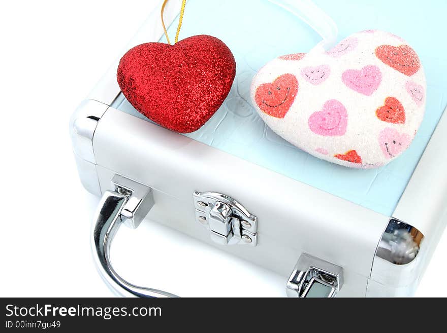 Briefcase and 2 hearts isolated 1