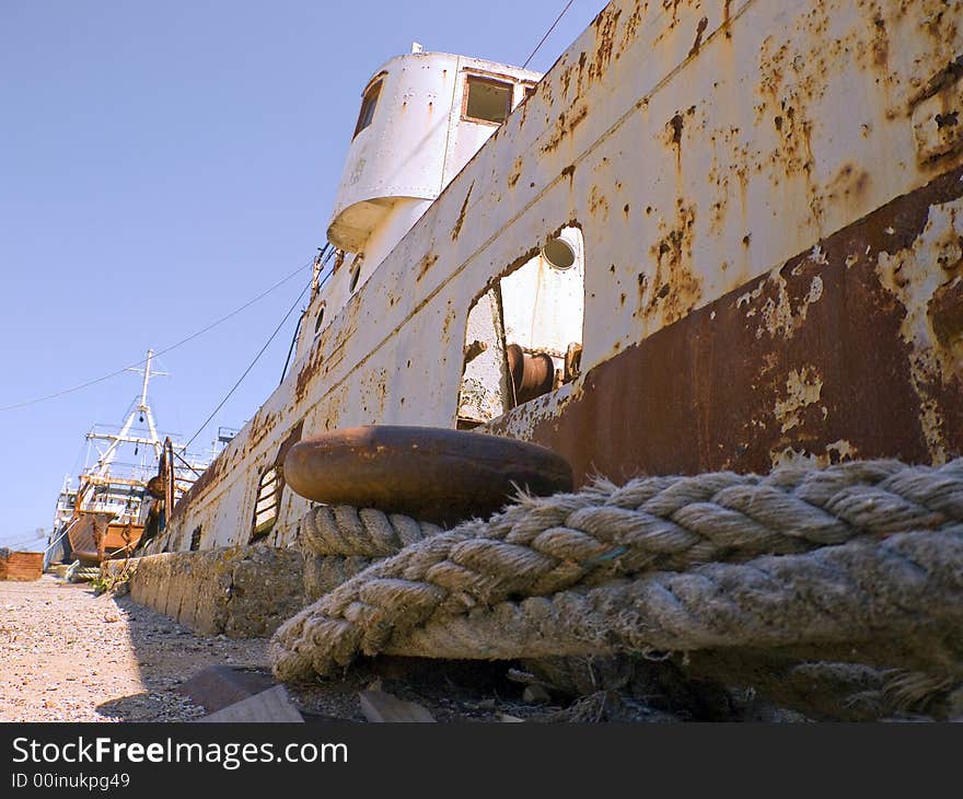 Detail of one rusty old ship in dock