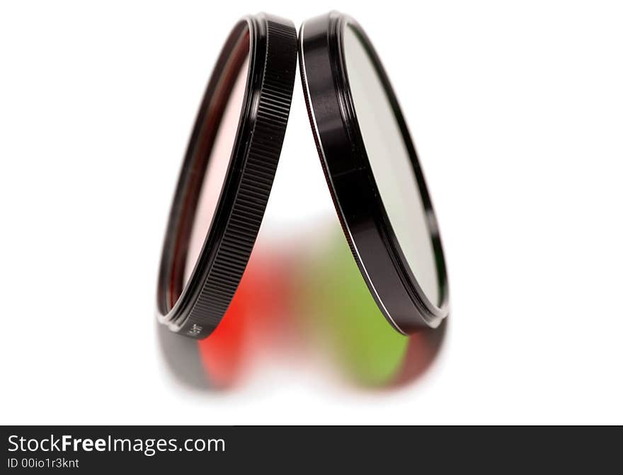 Red and green photographic filters projecting colorful light. Red and green photographic filters projecting colorful light