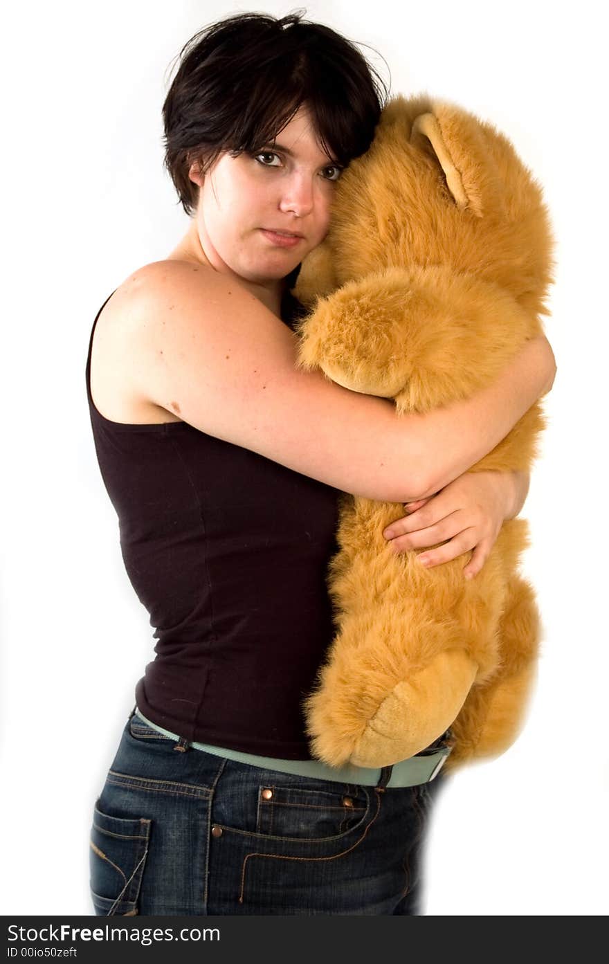 Young pretty woman cuddling with teddybear. Young pretty woman cuddling with teddybear