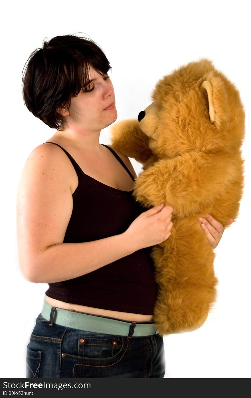 Young lady holding a teddybear. Young lady holding a teddybear