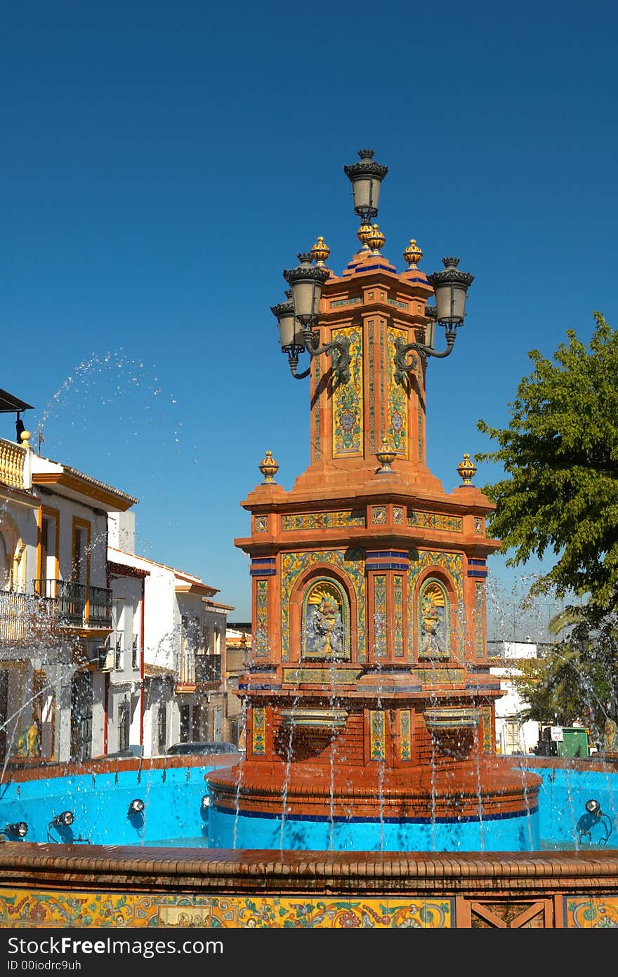 Traditional city fountain in small spanish style