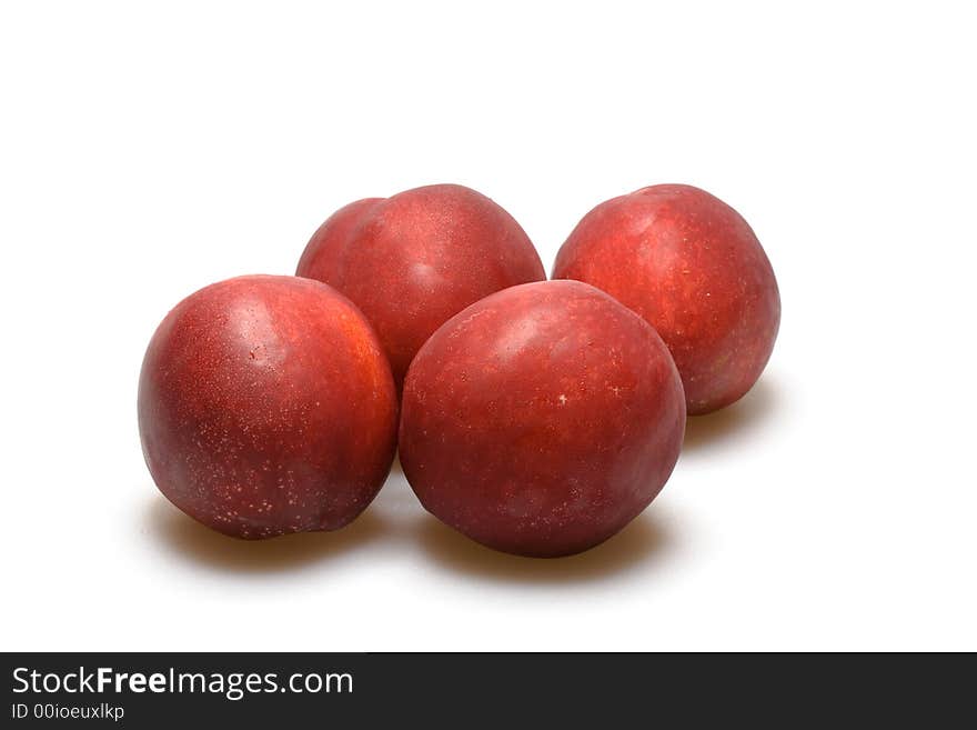 Four nectarine (peaches)