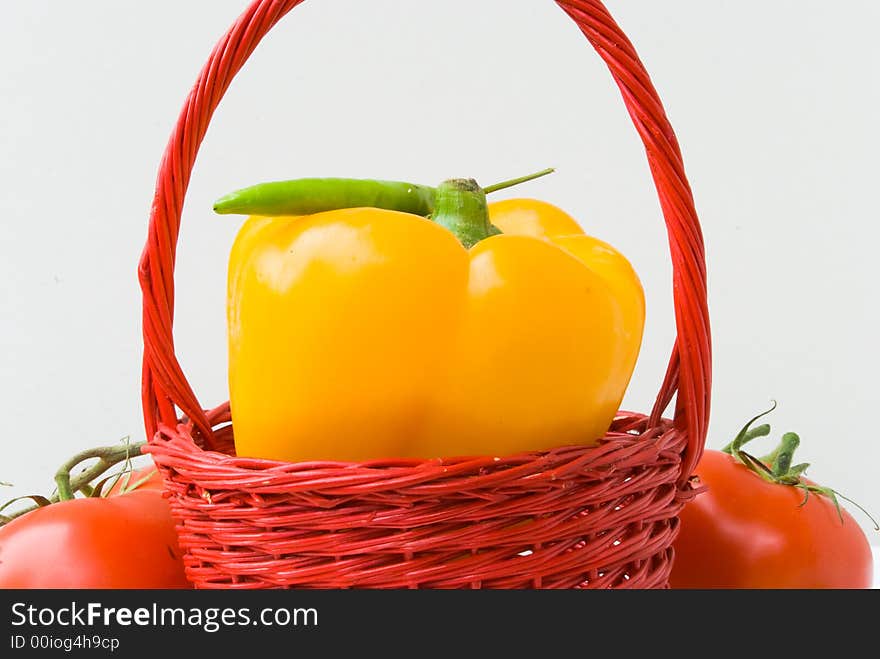 Red Basket With Yellow Pepper