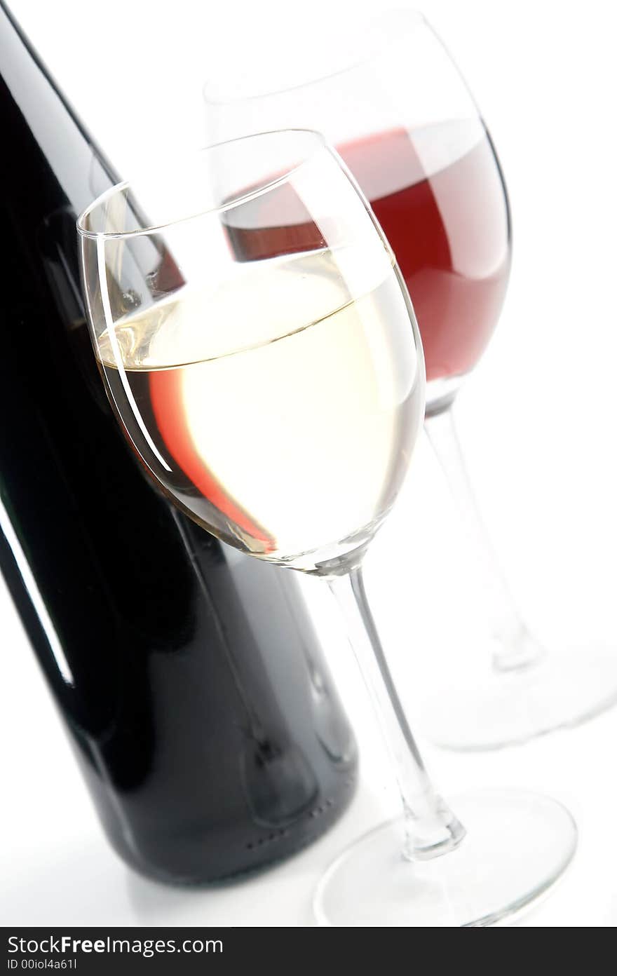 Still life with red and white wines on the white background