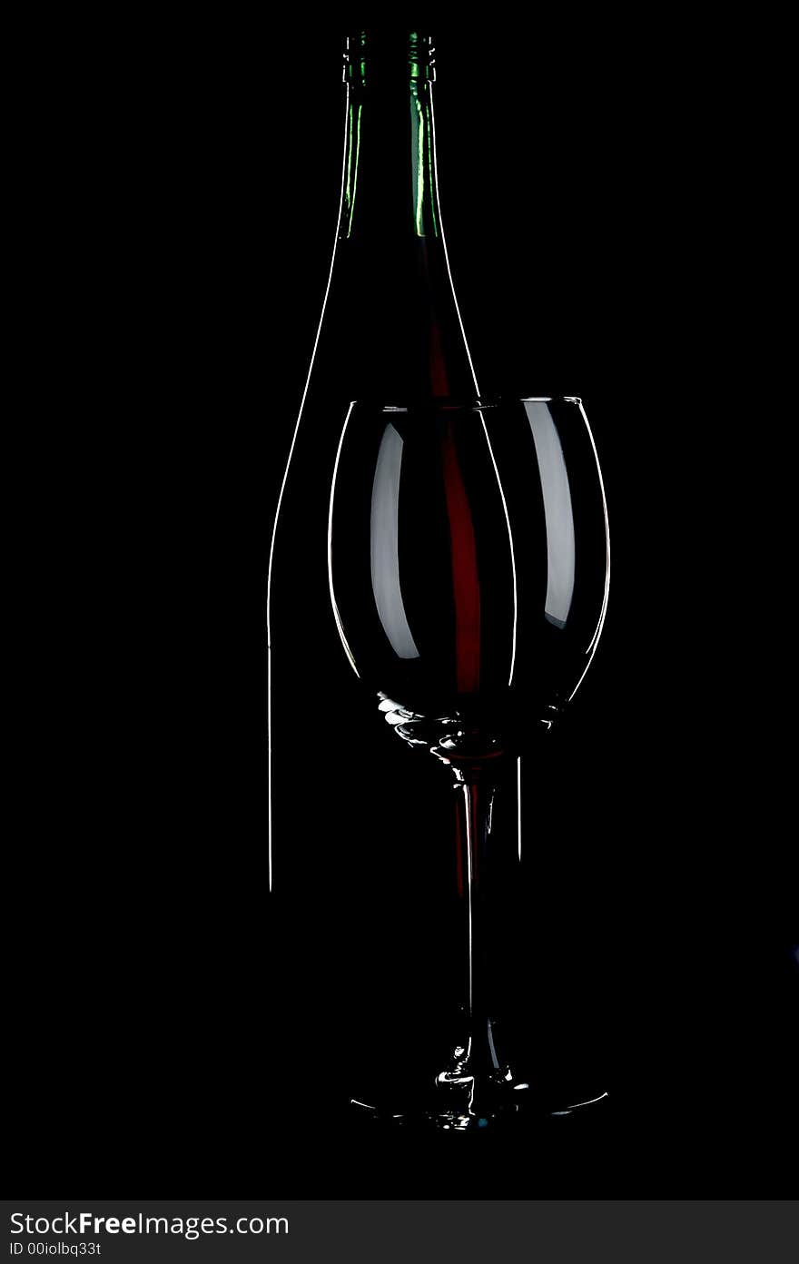 Still life with red wines on the black background