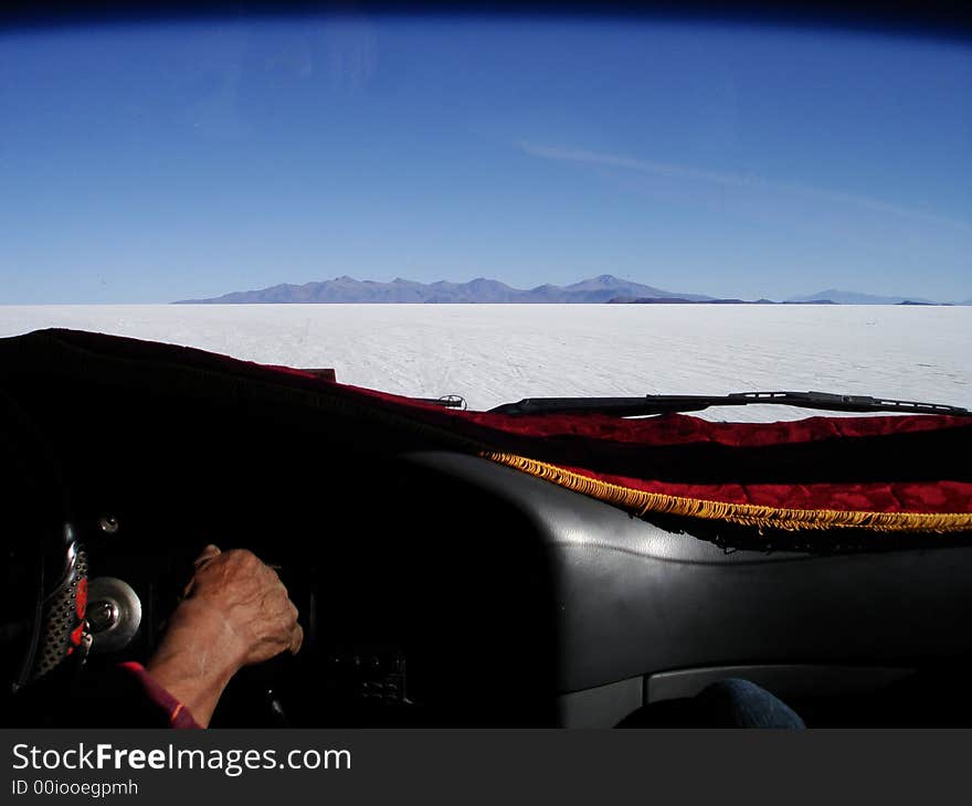 The inside of a truck driving across salt plains in Uyuni in Bolivia.