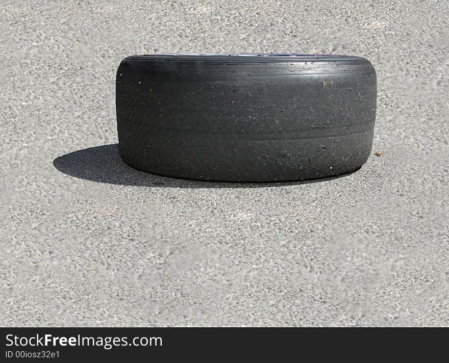 Worn race tyre on the ground