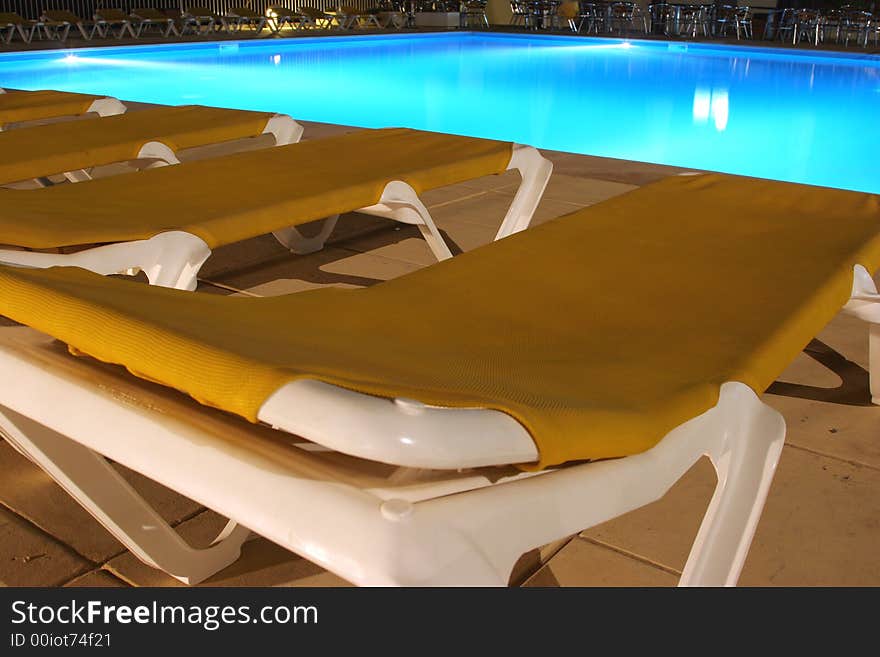 View of sunbeds and pool