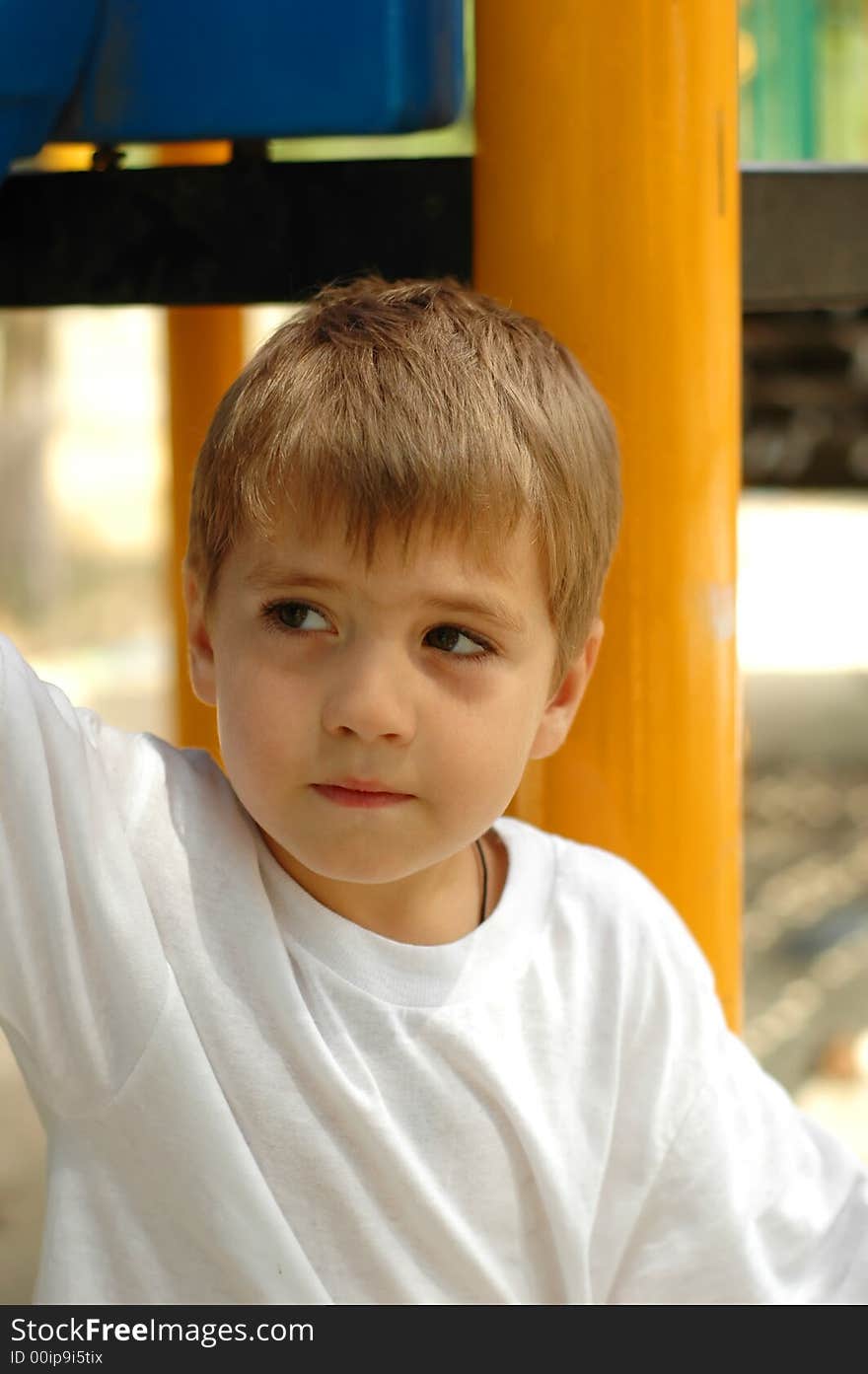 Handsome boy at outdoors playground