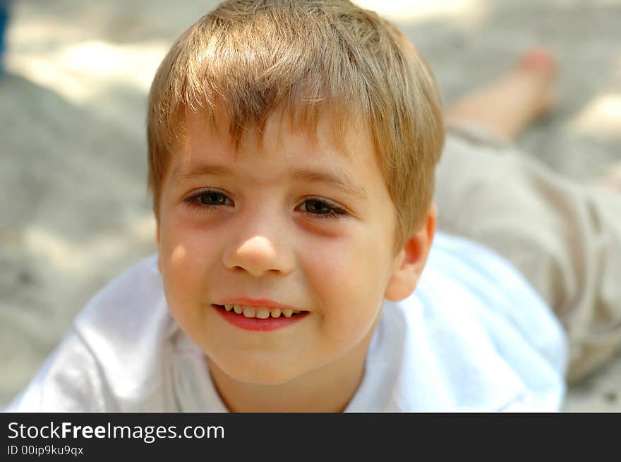 Handsome boy at outdoors playground