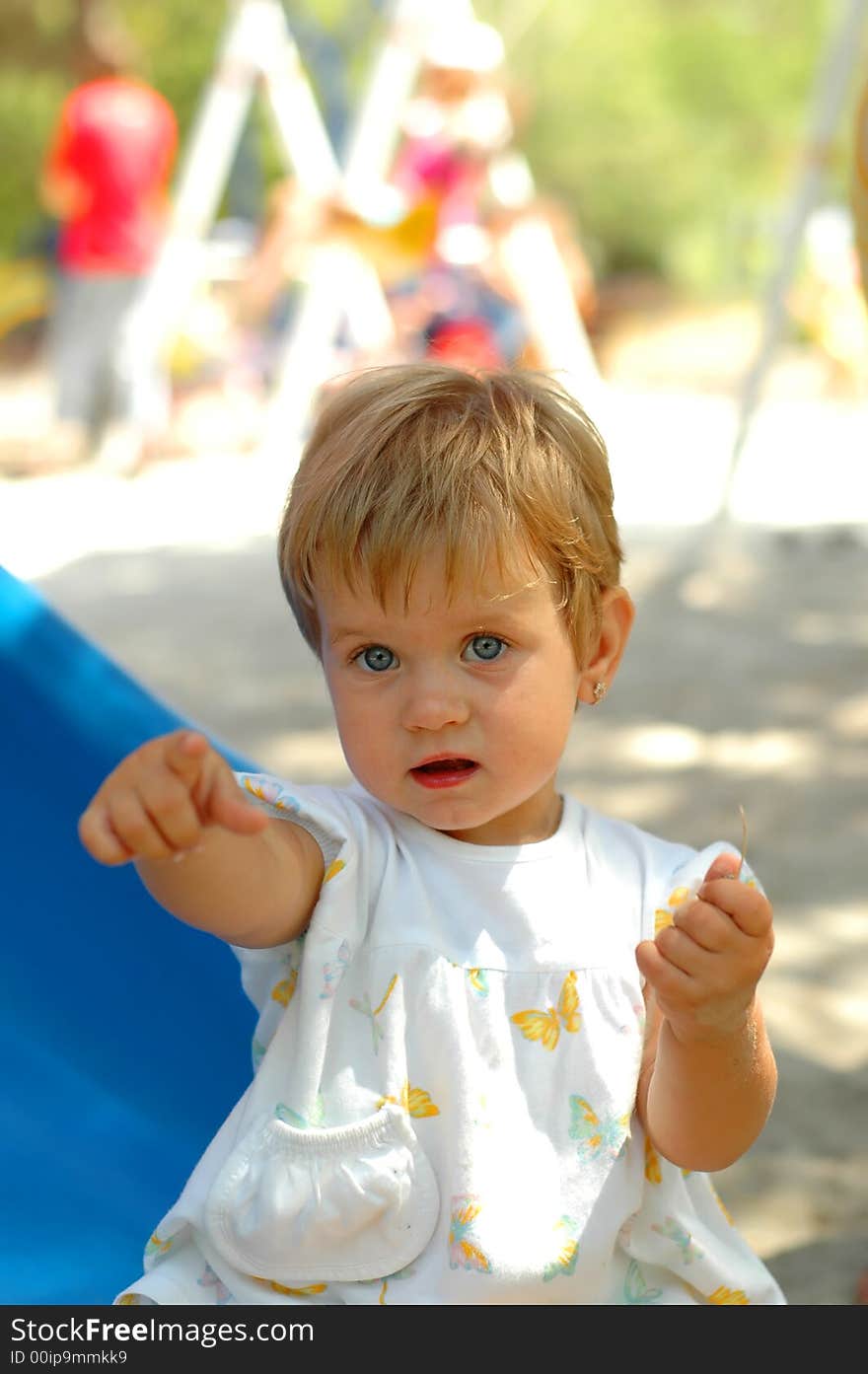 Fun girl at outdoors playground