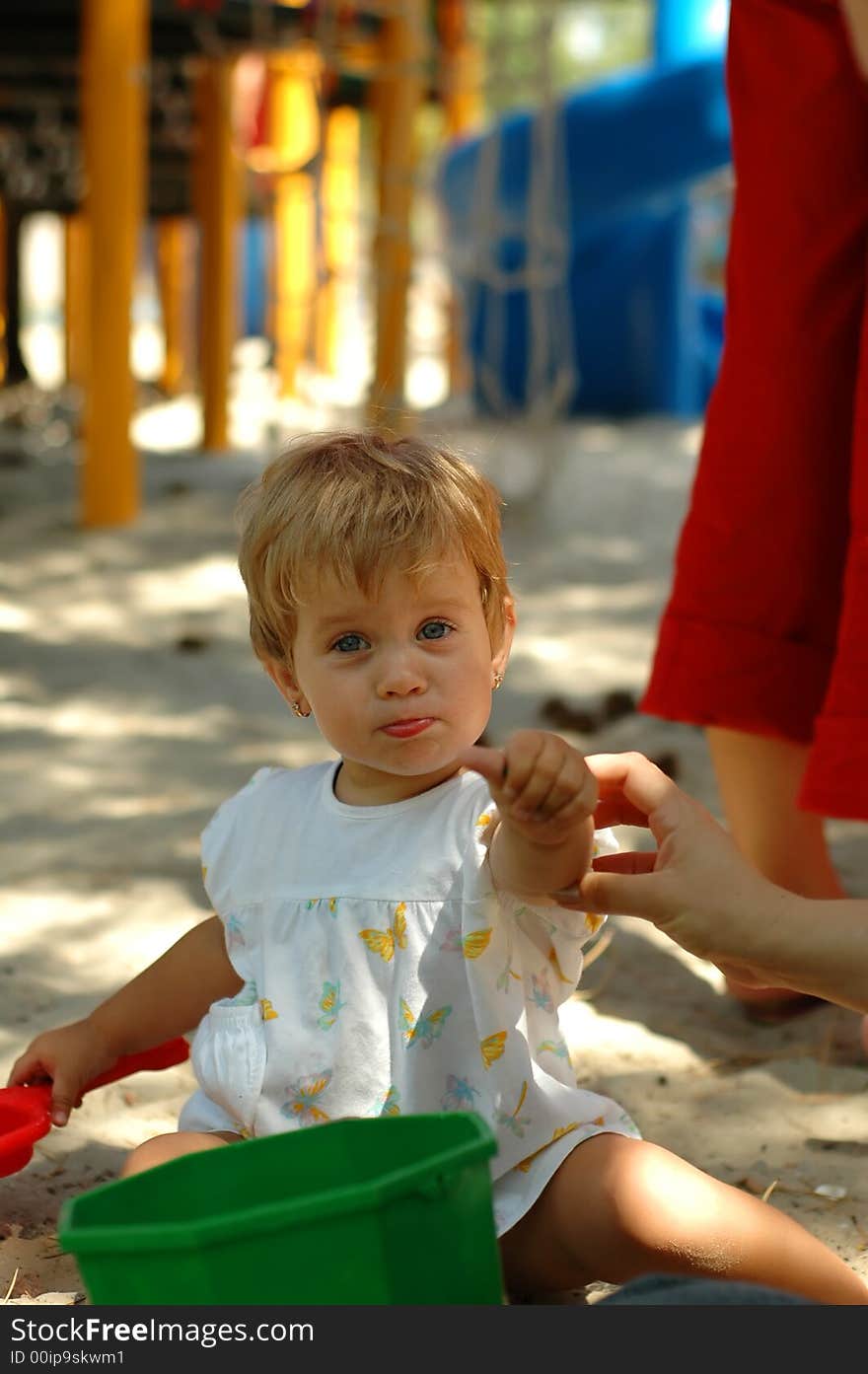 Fun girl at outdoors playground