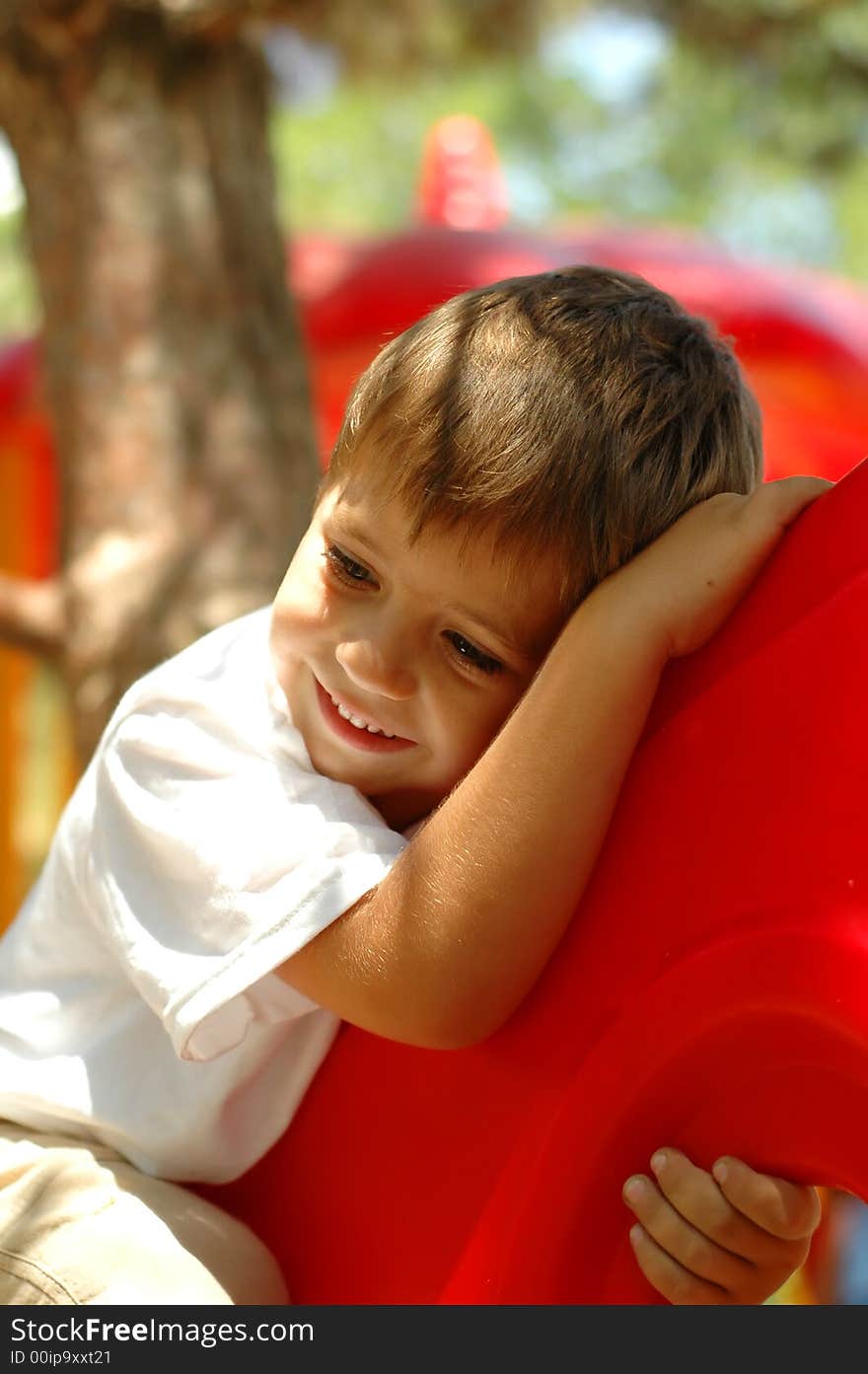 Handsome boy at outdoors playground