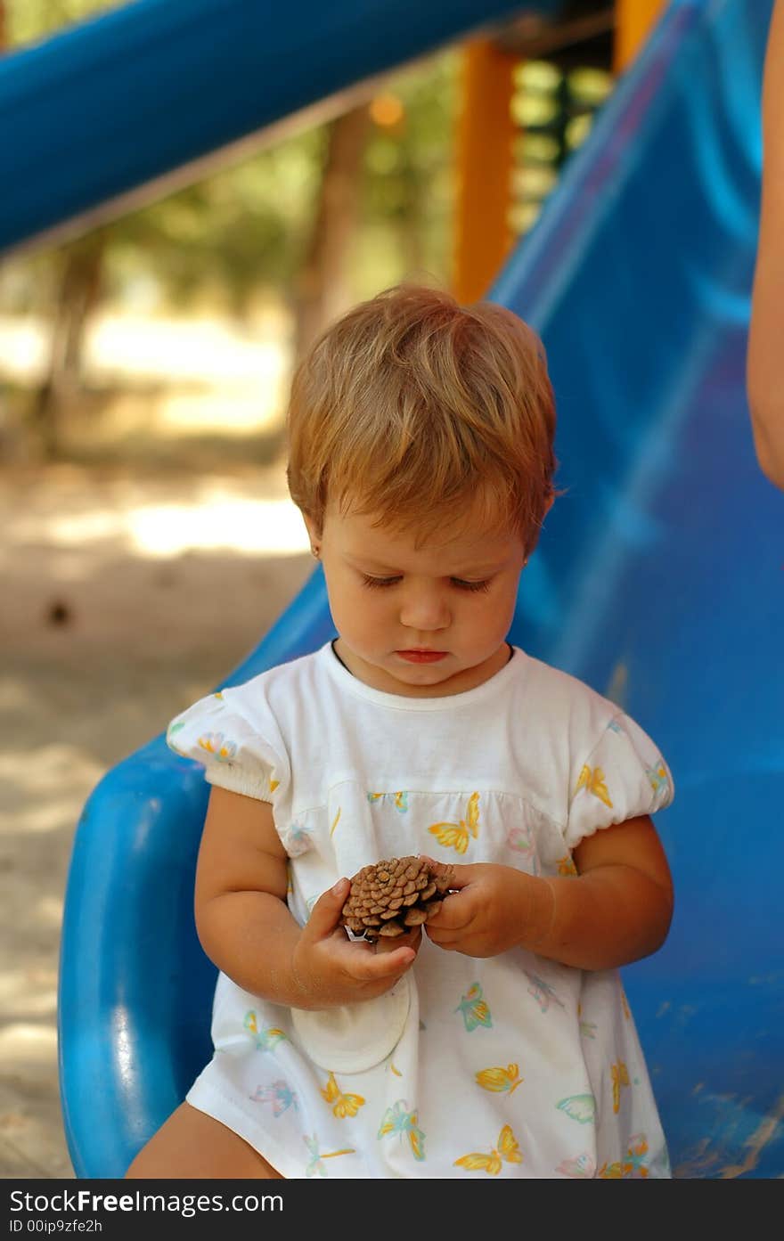 Fun girl at outdoors playground