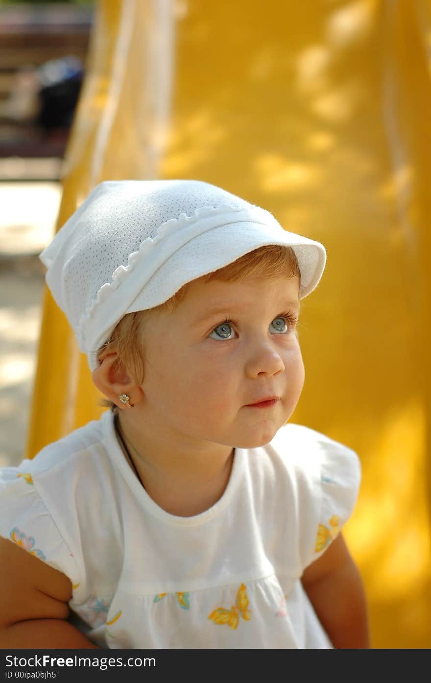 Fun girl at outdoors playground