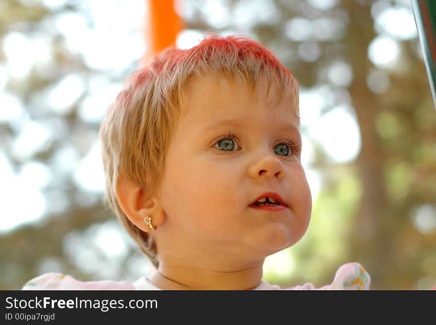 Fun girl at outdoors playground