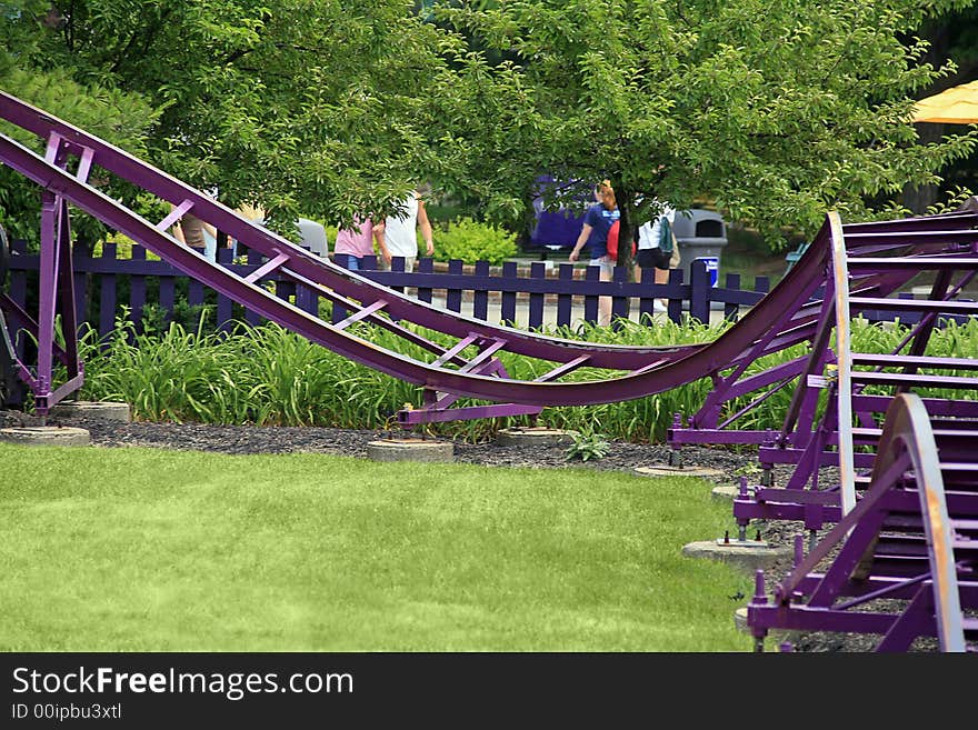 Purple Children's Roller Coaster at an Amusement Park