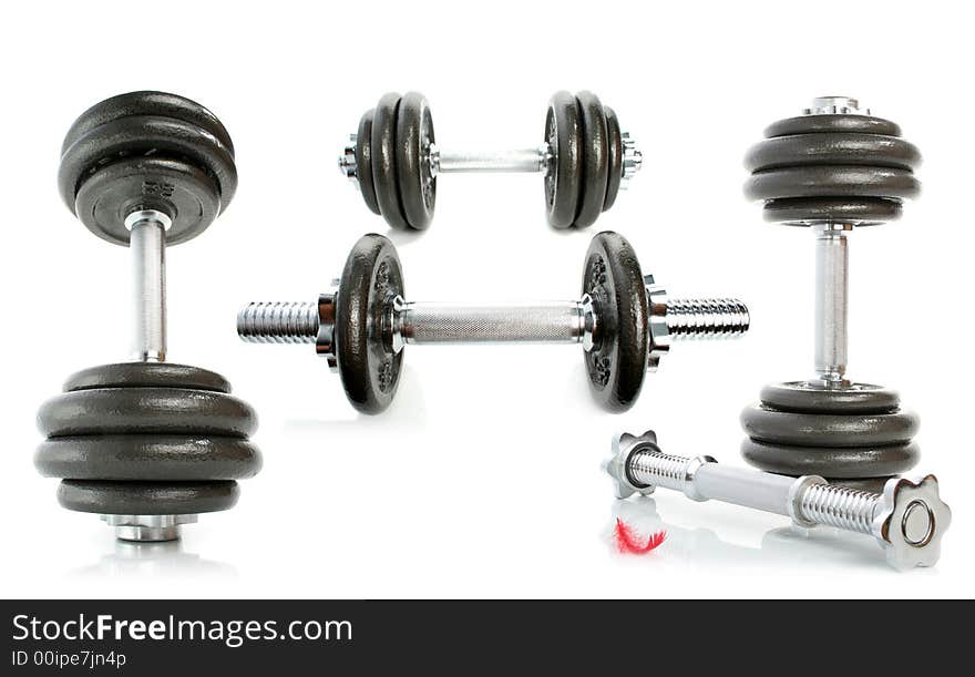 Iron dumbbells and feather isolated on white 5. Iron dumbbells and feather isolated on white 5