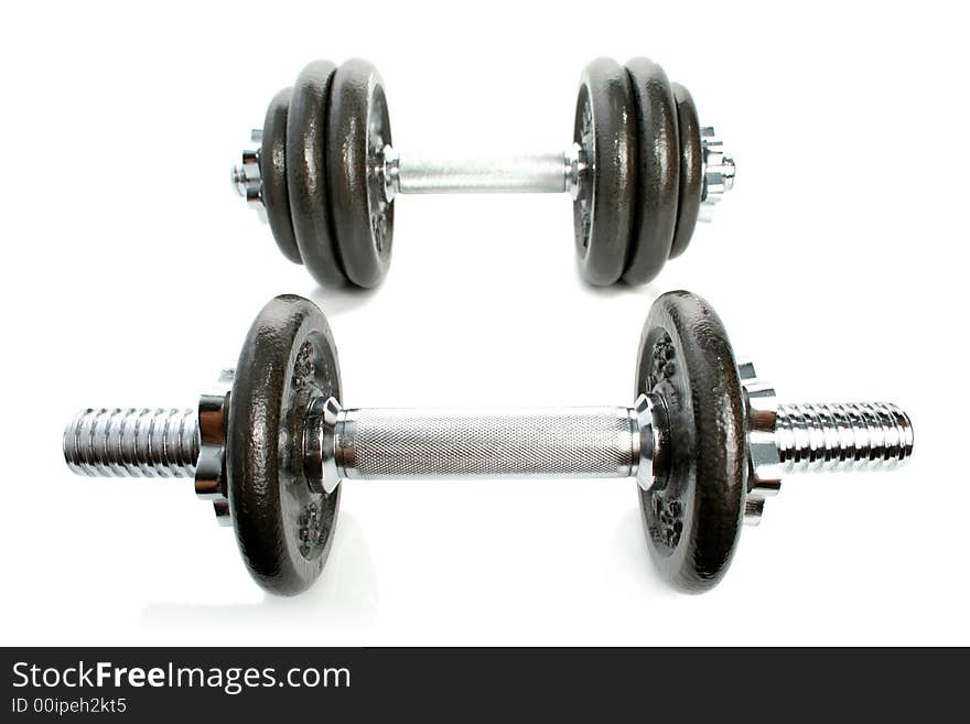 Iron dumbbells on white