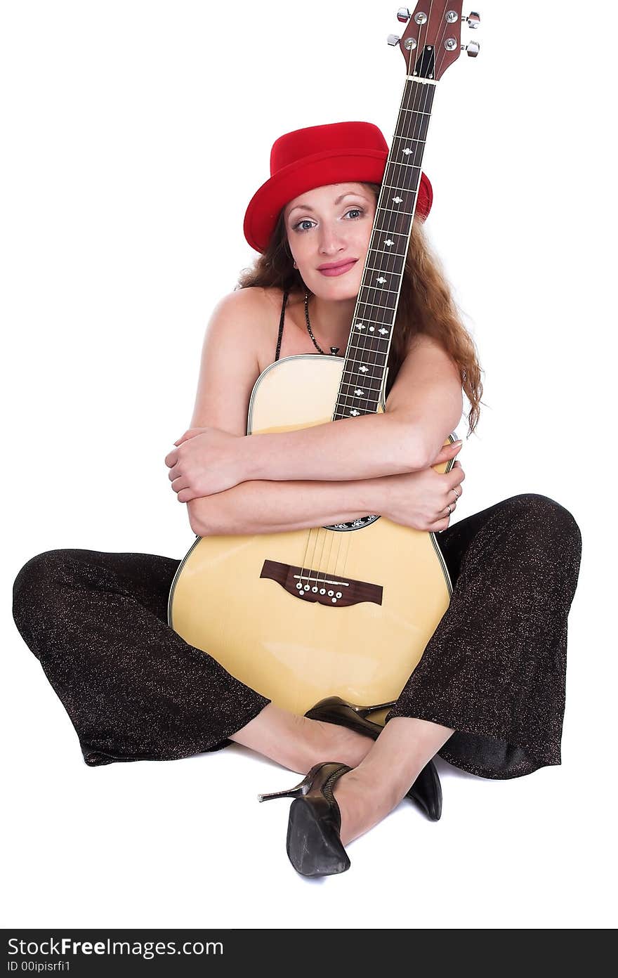 The woman embraces a guitar