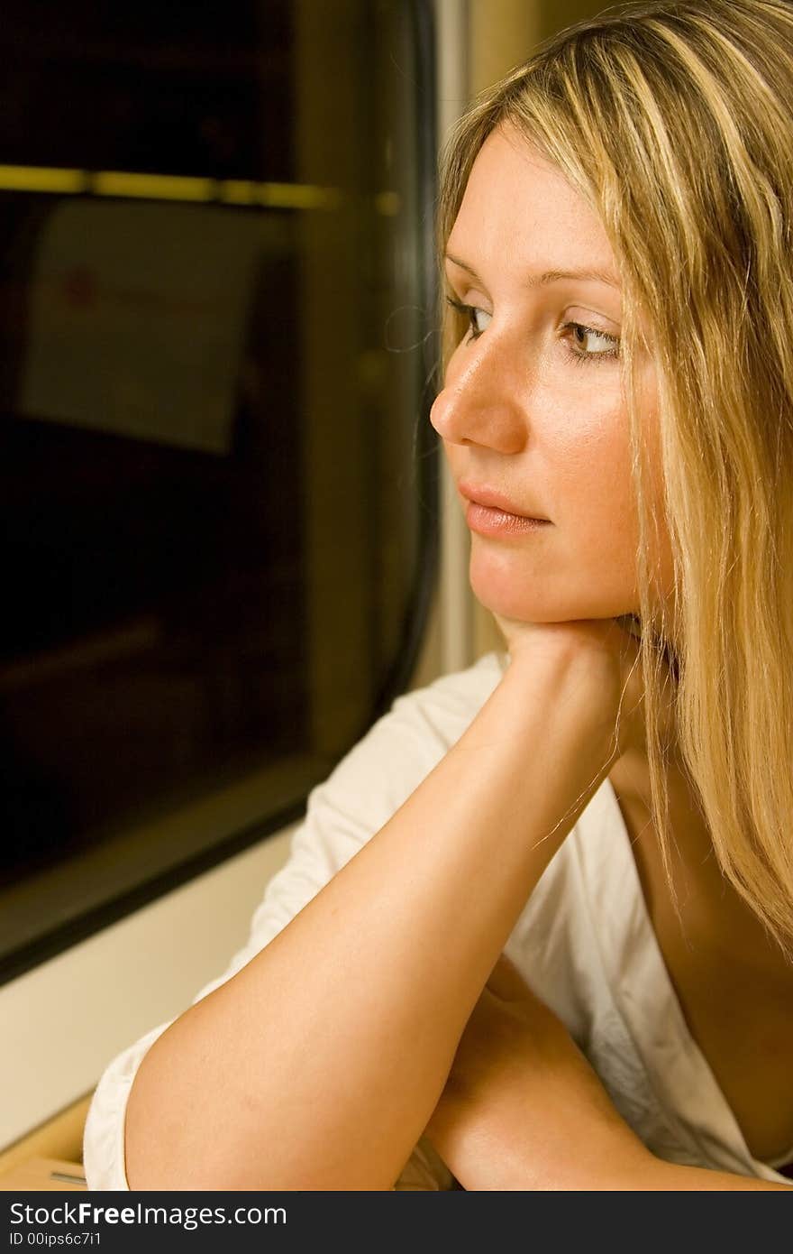 Young woman in vintage train