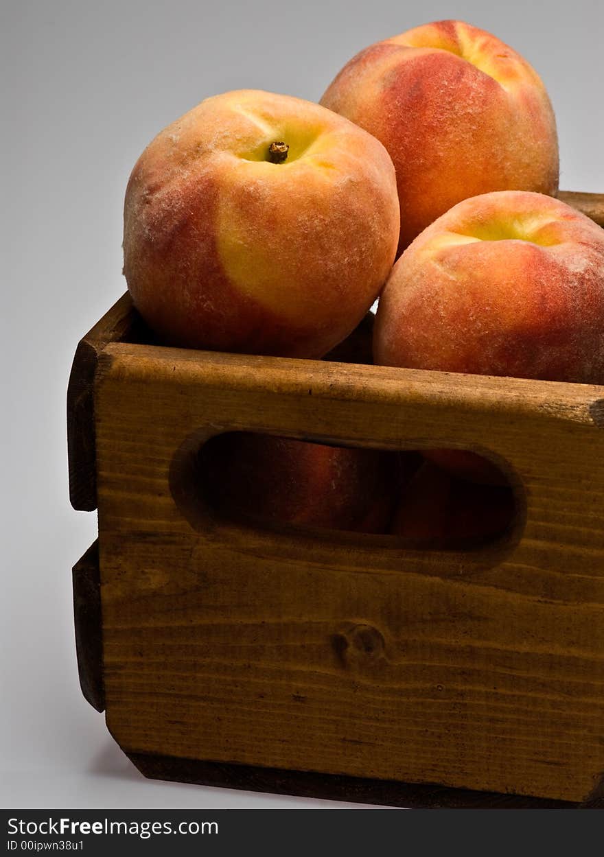 Peached in wooden crate