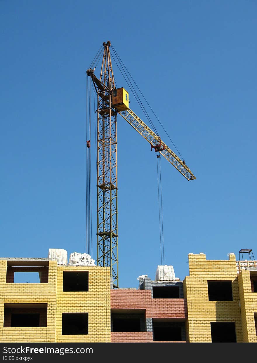 Building crane on construction vein high-rise building