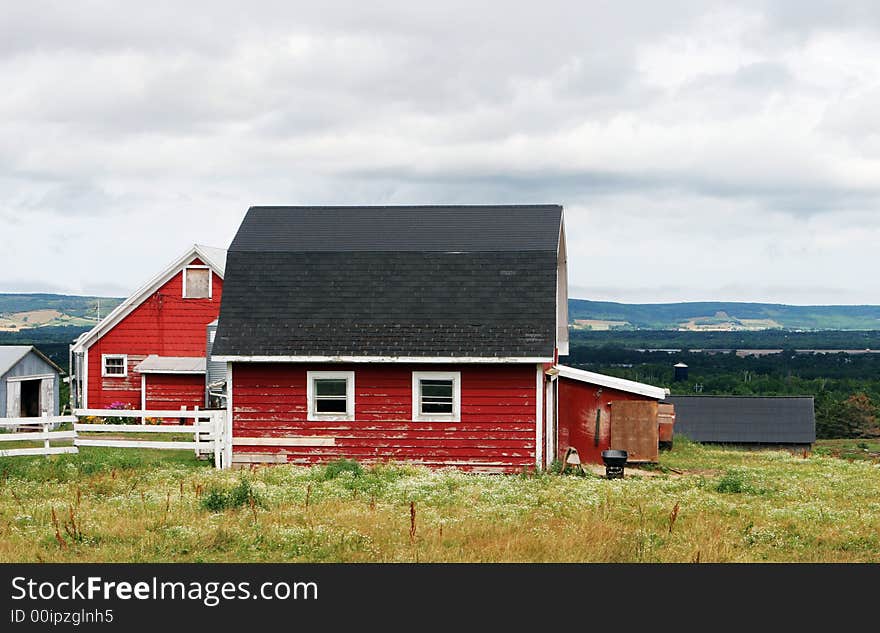 Red barn and farm buildings - countryside scenic.