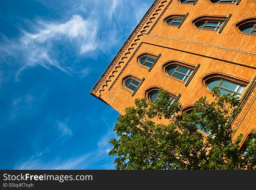 An office building taken at an interesting angle. An office building taken at an interesting angle