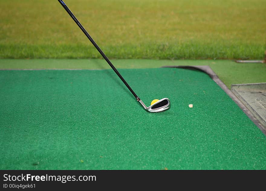 Senior golfer play golf in the city golf school field. Senior golfer play golf in the city golf school field