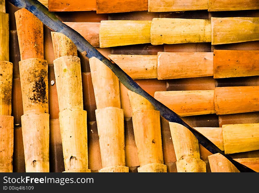 Symmetrical pattern in terracotta roofing tiles. Symmetrical pattern in terracotta roofing tiles