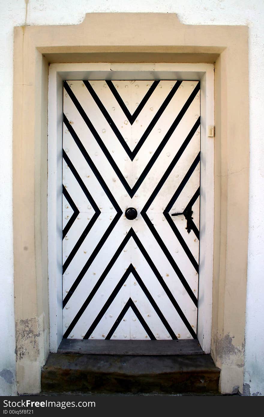 Old stylish door on the castle Bouzov in Czech