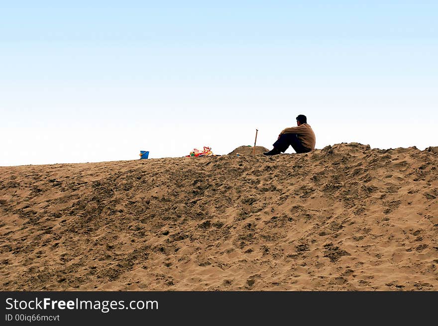 Father of family on dunes. Father of family on dunes