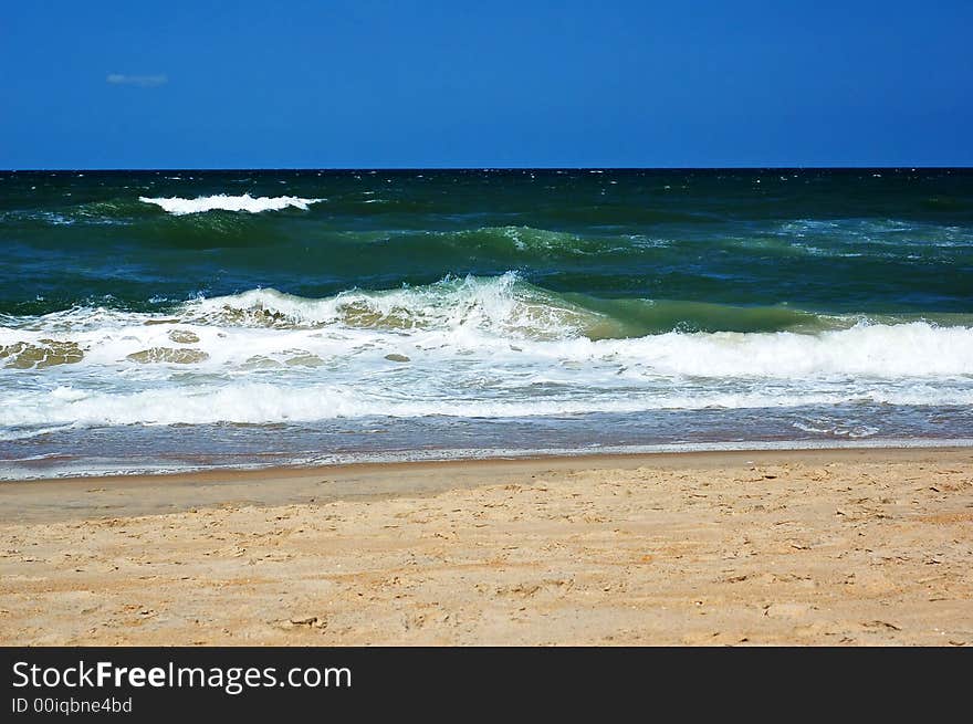 Photo of a sunny beach. Photo of a sunny beach.