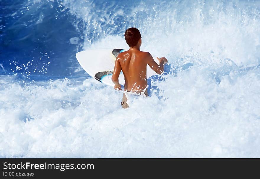 Photo of male skim boarder. Photo of male skim boarder.