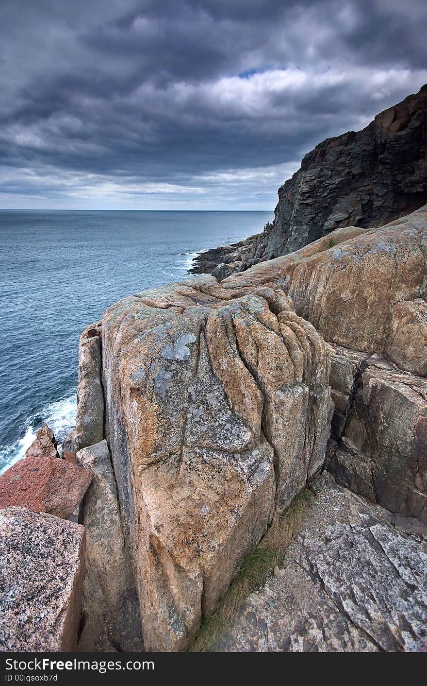 A storm was coming to the coast of Acadia National Park of Maine in early Spring, which made the place with special atmosphere. It's serene but with strong light contrast; therefore, very impressive. A storm was coming to the coast of Acadia National Park of Maine in early Spring, which made the place with special atmosphere. It's serene but with strong light contrast; therefore, very impressive.