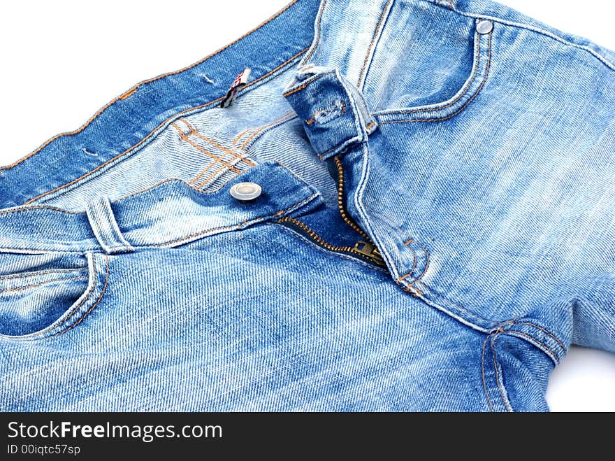 Isolated part of female jeans.